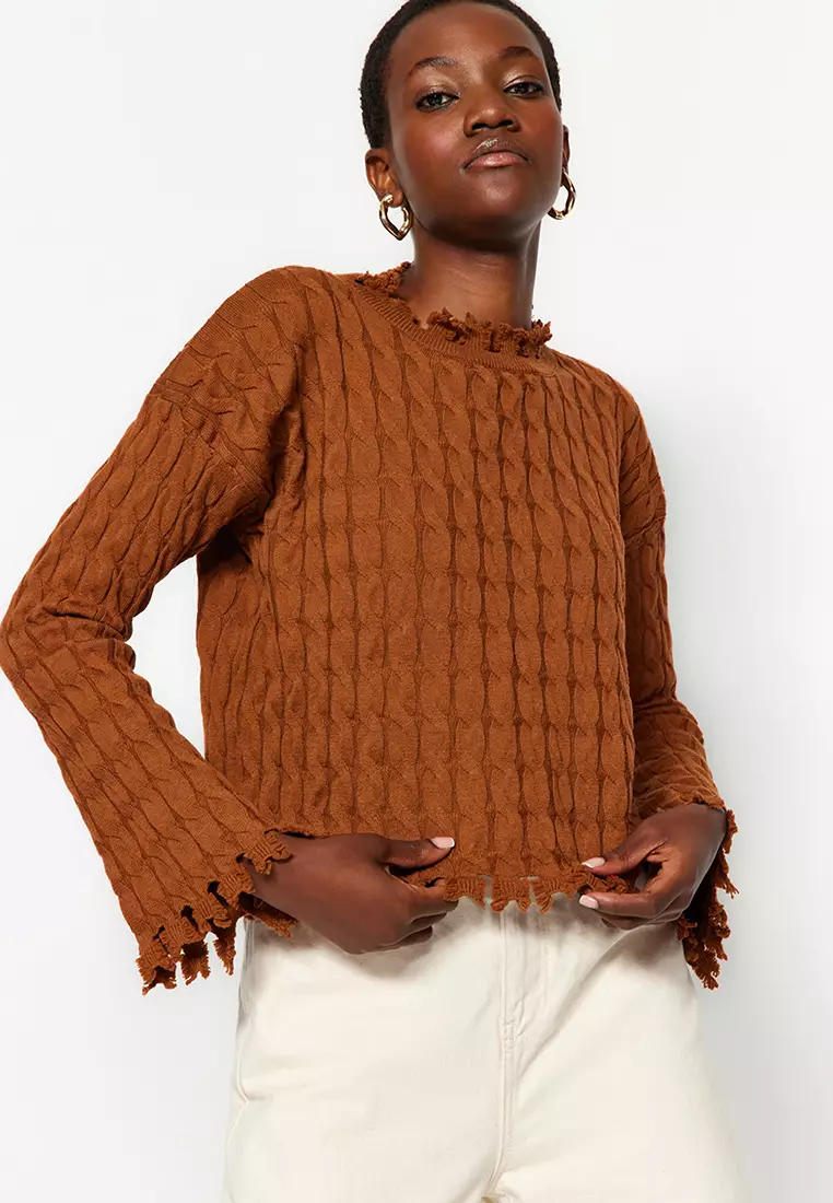 “Knit Wit: Fun and Creative Ways to Wear Your Favorite Sweaters”